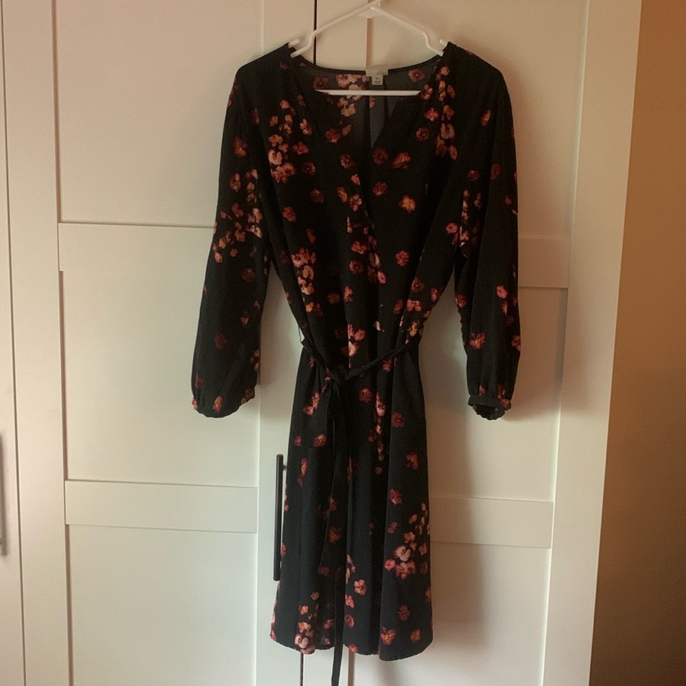 Black dress with floral detail, belted waist